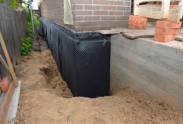 SJ Waterproofing Pros technician performing targeted Vapor Barrier Installation assessment in Lyons, OR